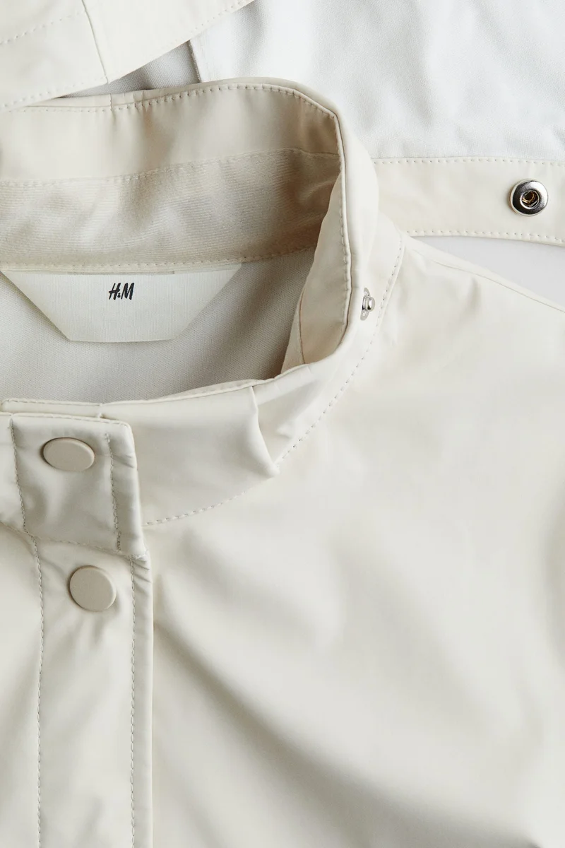 اتش اند ام جاكيت من نسيج مقاوم للمطر